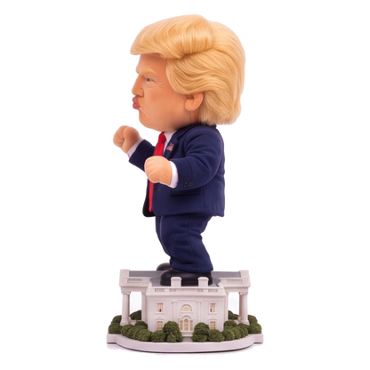 Talking Trump desk toy, side view showing puckered lips and plush suit