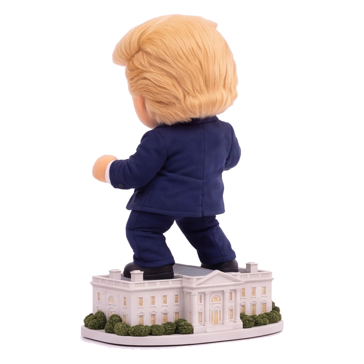 Talking Trump desk toy, back angle view of hair and White House base