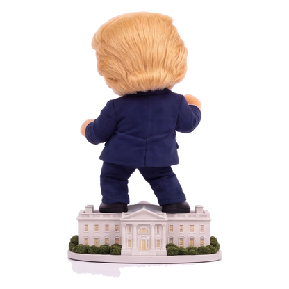 Talking Trump desk toy, back view with detailed White House base